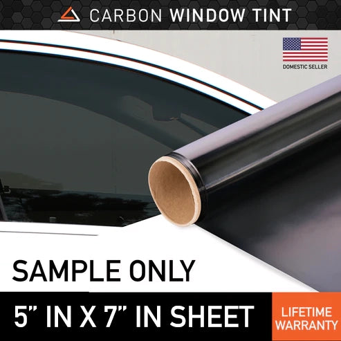 A 5x7 sheet displaying carbon window tint with a text sample, illustrating its design and texture.